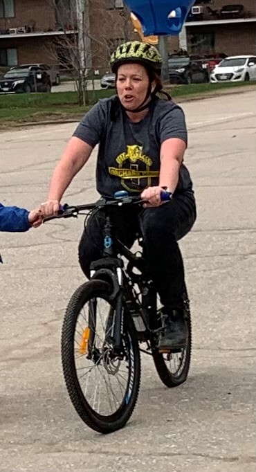 Image of a person riding a bike