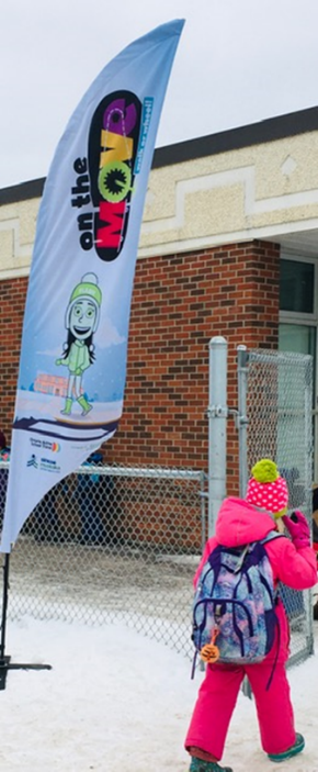 image of a feather flag and child promoting walking in winter